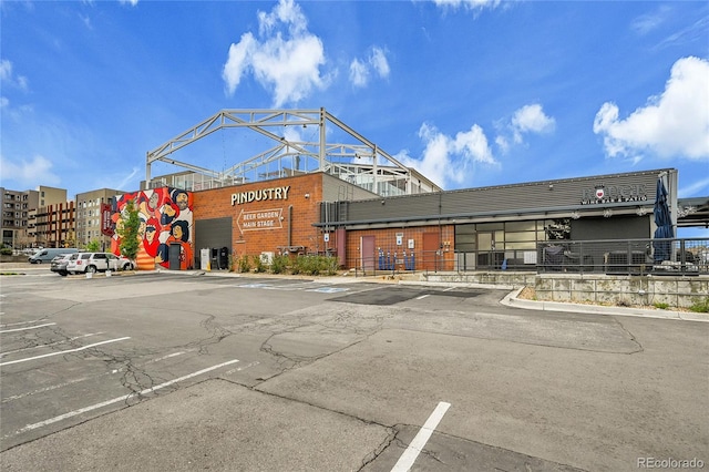 7076 S Spruce Dr W, Centennial, CO 80112 - view of commercial property featuring uncovered parking