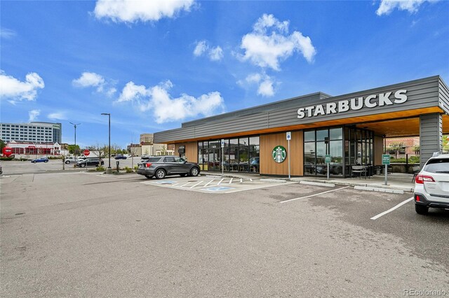 7076 S Spruce Dr W, Centennial, CO 80112 - view of commercial location featuring uncovered parking