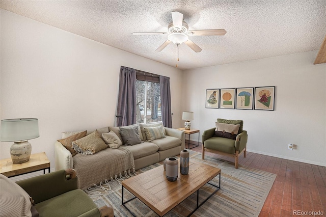 3593 S Kittredge St Unit E, Aurora, CO 80013 - living room featuring a textured ceiling, a ceiling fan, and hardwood / wood-style flooring