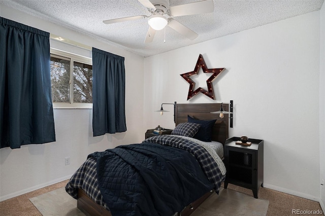 3593 S Kittredge St Unit E, Aurora, CO 80013 - carpeted bedroom with a textured ceiling and a ceiling fan