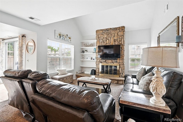 13228 E Asbury Dr, Aurora, CO 80014 - living area featuring vaulted ceiling and a fireplace