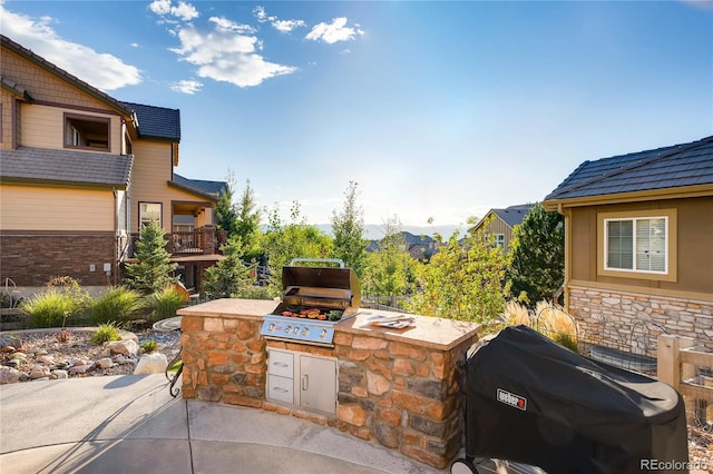 view of patio / terrace with exterior kitchen and area for grilling