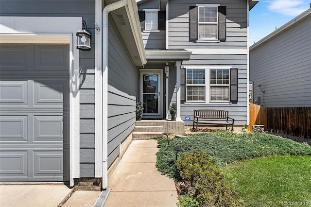 2695 E 109th Ave, Northglenn, CO 80233 - property entrance featuring an attached garage