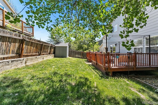 2695 E 109th Ave, Northglenn, CO 80233 - fenced backyard with a storage shed and a deck