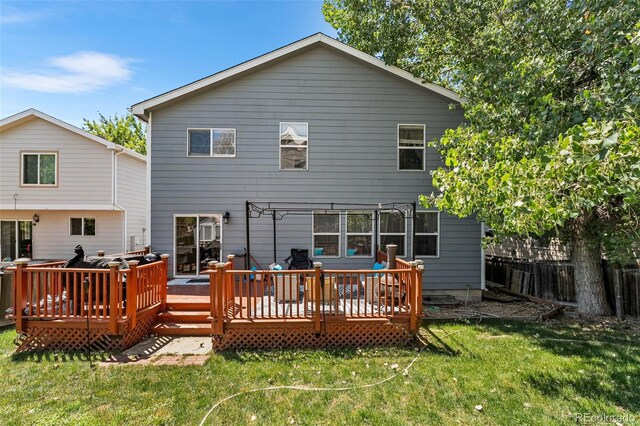 2695 E 109th Ave, Northglenn, CO 80233 - rear view of house with a deck and a pergola