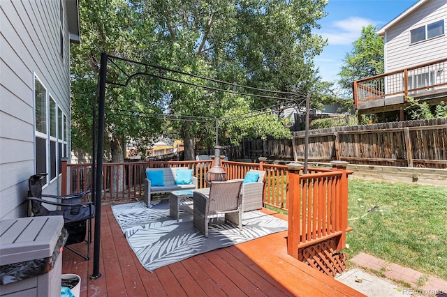 2695 E 109th Ave, Northglenn, CO 80233 - wooden deck featuring an outdoor hangout area and a fenced backyard