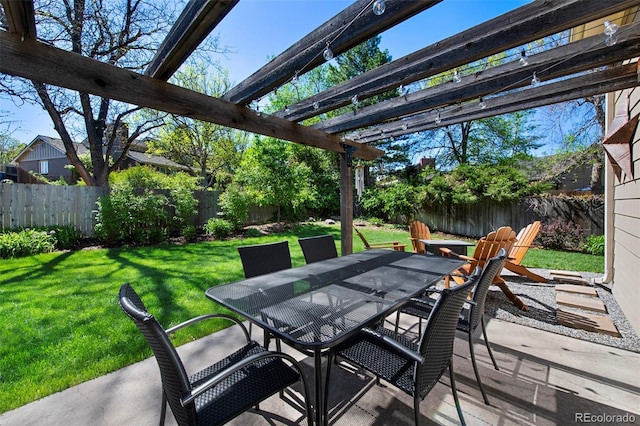 view of patio with a pergola and outdoor dining area