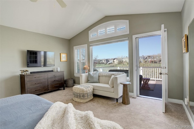 bedroom with lofted ceiling, access to exterior, baseboards, light colored carpet, and a ceiling fan