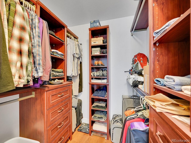 1052 Northampton Ct, Highlands Ranch, CO 80126 - walk in closet with light wood finished floors