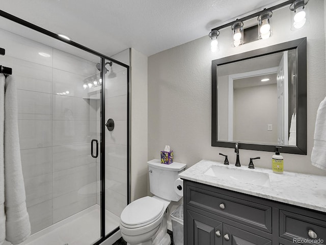 1052 Northampton Ct, Highlands Ranch, CO 80126 - full bathroom with vanity, a shower stall, a textured ceiling, and a textured wall