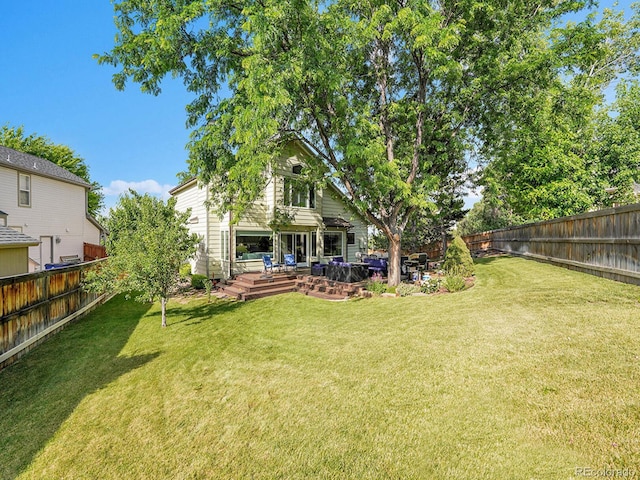 1052 Northampton Ct, Highlands Ranch, CO 80126 - fenced backyard featuring a wooden deck