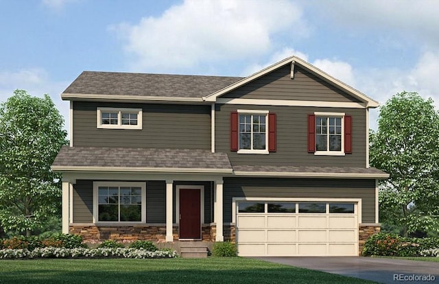 view of front of house with a garage and a front yard