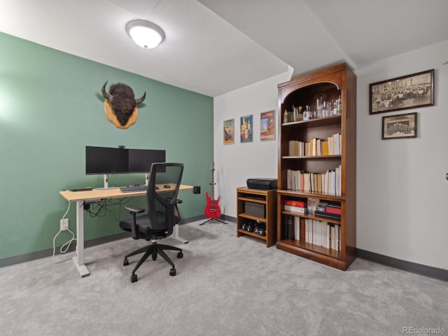 office area featuring carpet floors and baseboards