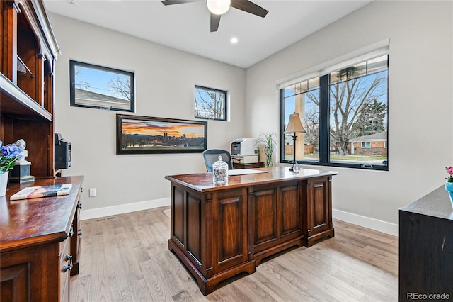 office featuring light wood-style flooring, recessed lighting, a ceiling fan, and baseboards