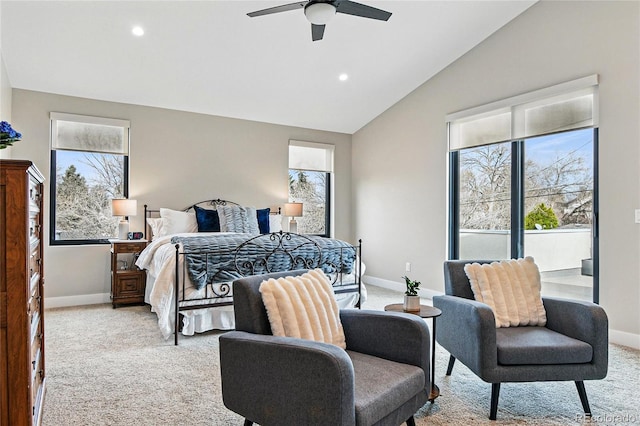 bedroom featuring lofted ceiling, baseboards, and light carpet