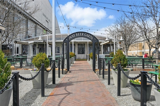 view of community with fence