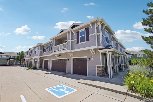 17145 Waterhouse Cir Unit F, Parker, CO 80134 - view of property with an attached garage and a residential view