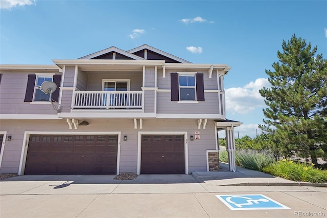 17145 Waterhouse Cir Unit F, Parker, CO 80134 - craftsman-style home featuring a balcony, concrete driveway, and a garage