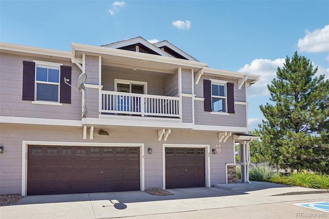 17145 Waterhouse Cir Unit F, Parker, CO 80134 - view of front facade featuring a balcony, a garage, and concrete driveway
