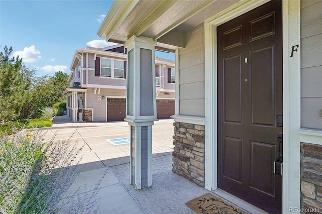 17145 Waterhouse Cir Unit F, Parker, CO 80134 - doorway to property featuring stone siding