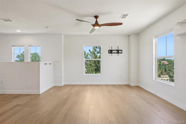 17145 Waterhouse Cir Unit F, Parker, CO 80134 - spare room featuring plenty of natural light, light wood finished floors, a ceiling fan, and recessed lighting
