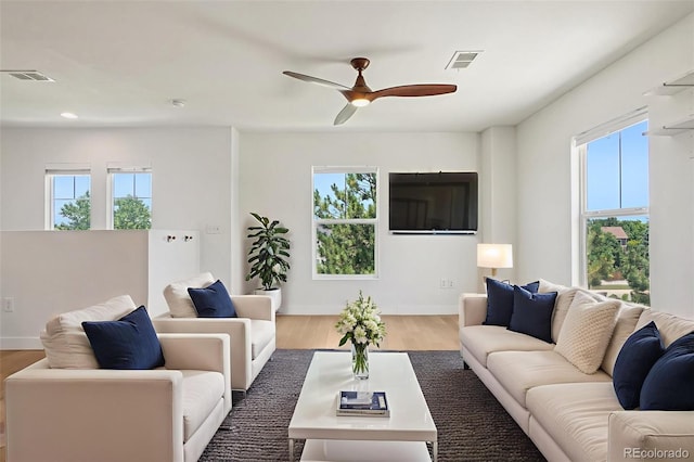 17145 Waterhouse Cir Unit F, Parker, CO 80134 - living room with wood finished floors, a ceiling fan, and recessed lighting