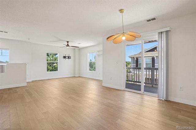 17145 Waterhouse Cir Unit F, Parker, CO 80134 - unfurnished living room with ceiling fan and light wood-style flooring