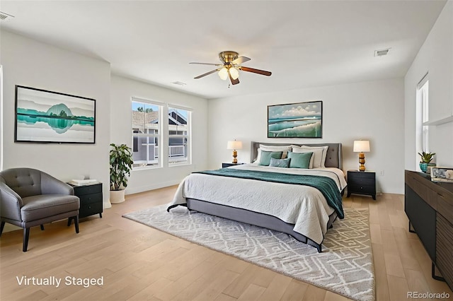 17145 Waterhouse Cir Unit F, Parker, CO 80134 - bedroom featuring light wood finished floors and ceiling fan