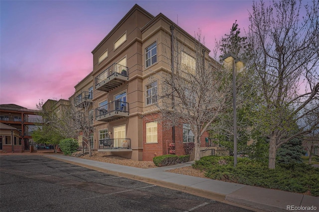 view of property at dusk