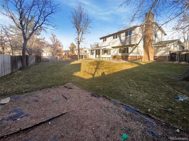 view of yard featuring a patio area and a fenced backyard