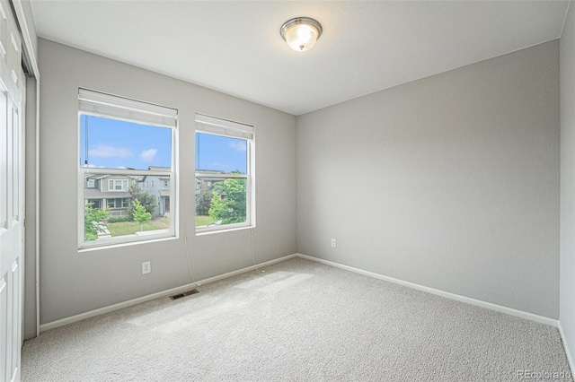 4760 Kittredge St, Denver, CO 80239 - spare room with carpet and baseboards