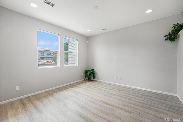 4760 Kittredge St, Denver, CO 80239 - spare room with light wood-type flooring, baseboards, and recessed lighting