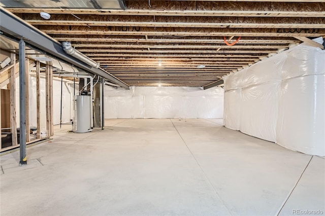 basement featuring water heater