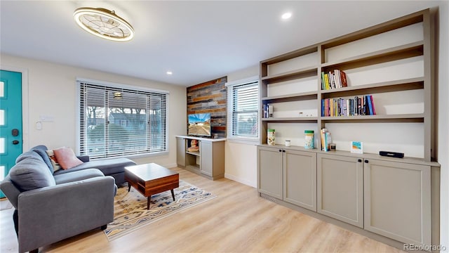 living room featuring recessed lighting and light wood-style flooring