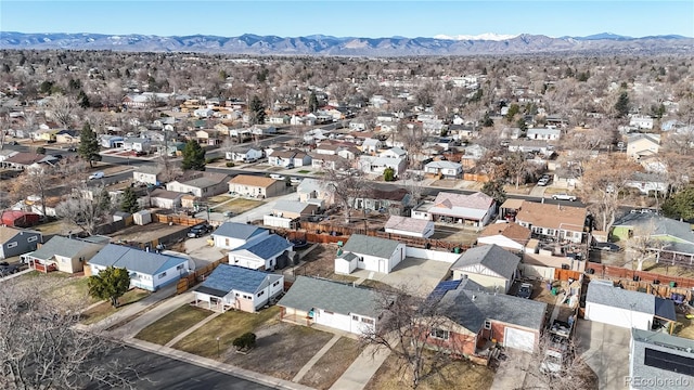 drone / aerial view with a mountain view and a residential view