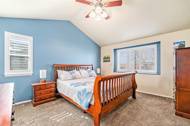 carpeted bedroom featuring lofted ceiling, baseboards, and a ceiling fan