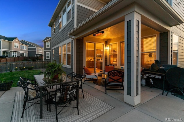 12264 Olive Way, Thornton, CO 80602 - view of patio with outdoor dining area, area for grilling, and a residential view