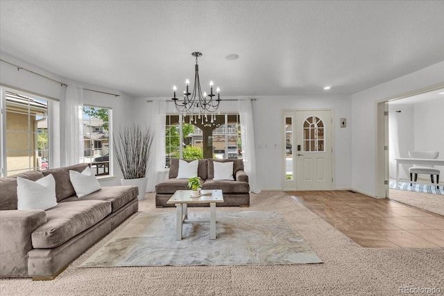 1385 Candleglow St, Castle Rock, CO 80109 - tiled living area with a chandelier and recessed lighting
