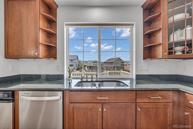 1385 Candleglow St, Castle Rock, CO 80109 - kitchen with open shelves, stainless steel dishwasher, a sink, dark stone countertops, and brown cabinets