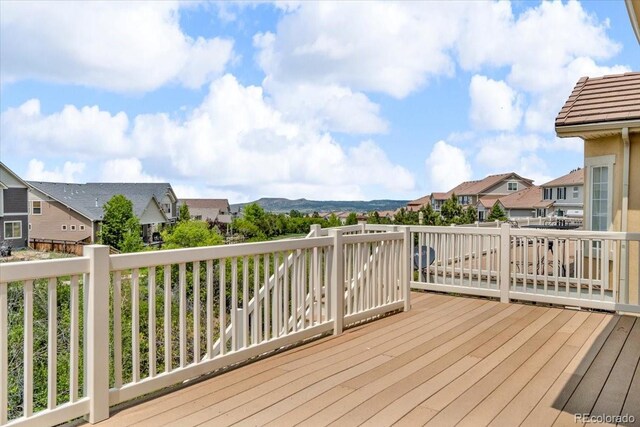 1385 Candleglow St, Castle Rock, CO 80109 - wooden terrace featuring a residential view