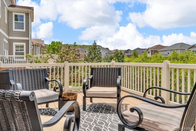 1385 Candleglow St, Castle Rock, CO 80109 - wooden terrace featuring a residential view