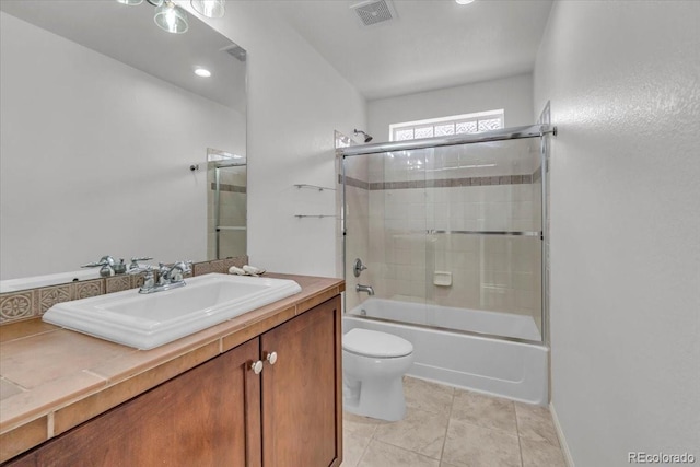 1385 Candleglow St, Castle Rock, CO 80109 - bathroom with toilet, vanity, shower / bath combination with glass door, and tile patterned floors