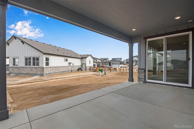 view of patio / terrace with a residential view