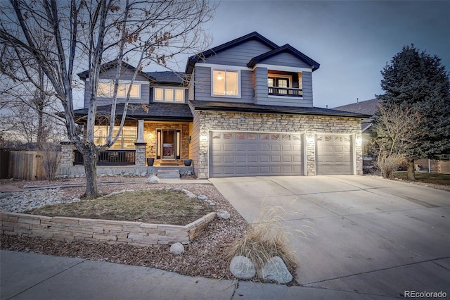 view of front of home with a garage and covered porch