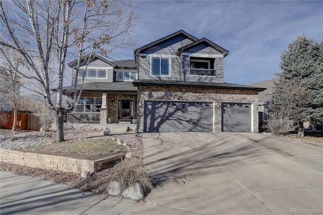 view of front of home with a garage and a porch