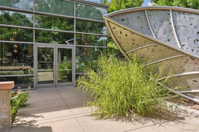 exterior details with a patio and french doors