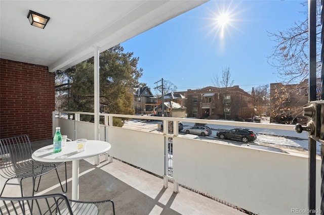 balcony featuring a residential view
