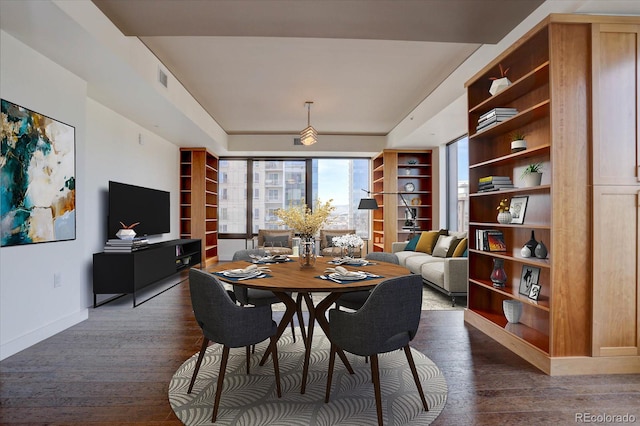 dining room featuring dark hardwood / wood-style floors