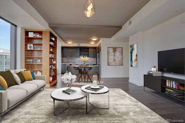 living room with dark wood-type flooring