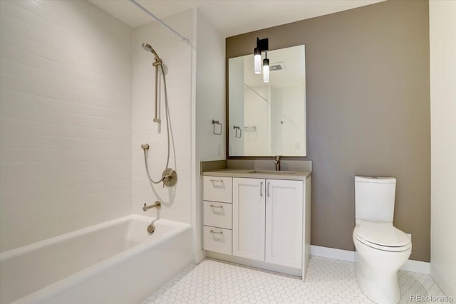 full bathroom with tile patterned floors, toilet, vanity, and tub / shower combination